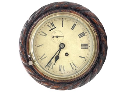 Lot 810 - A Smith's oak case wall timepiece.