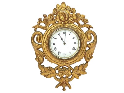 Lot 793 - A French gilt metal wall timepiece.