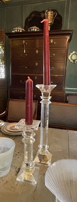 Lot 87 - Two similar graduated heavy cut glass column candlesticks.