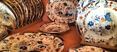 Lot 91 - A late Victorian ironstone style part dinner service.