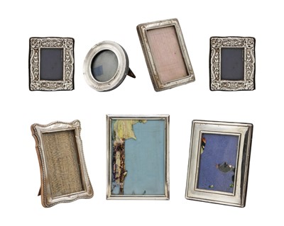 Lot 124 - A selection of seven silver applied photograph frames.