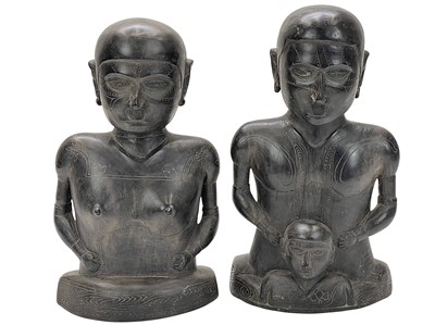 Lot 92 - A pair of carved ebony figures.