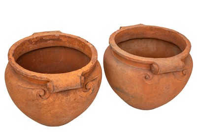 Lot 764 - A pair of Arts and Crafts Compton Pottery terracotta garden pots/planters.