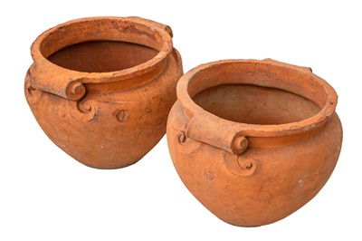 Lot 764 - A pair of Arts and Crafts Compton Pottery terracotta garden pots/planters.