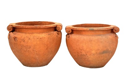 Lot 764 - A pair of Arts and Crafts Compton Pottery terracotta garden pots/planters.