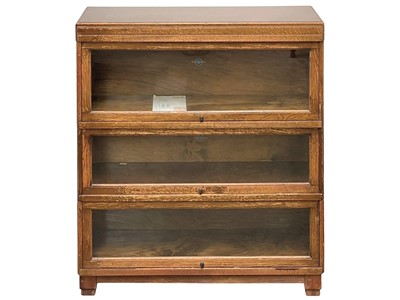 Lot 918 - A Globe Wernicke medium oak three section bookcase.