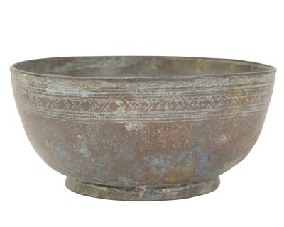 Lot 613 - A Middle Eastern Arabic copper bowl.