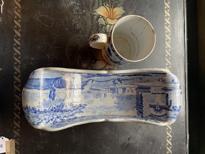 Lot 94 - A Staffordshire blue and white pottery cheese coaster.