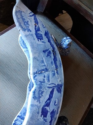 Lot 94 - A Staffordshire blue and white pottery cheese coaster.