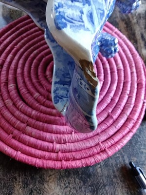 Lot 94 - A Staffordshire blue and white pottery cheese coaster.