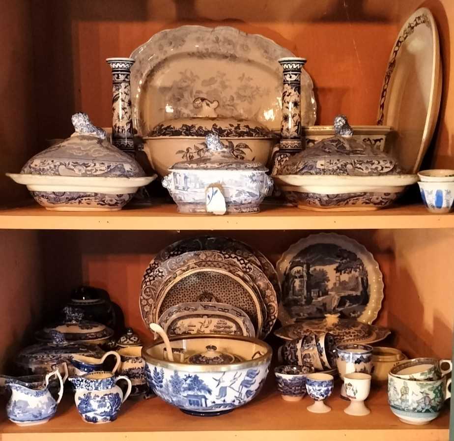 Lot 95 - Two shelves of mainly blue and white pottery.