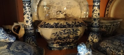 Lot 95 - Two shelves of mainly blue and white pottery.