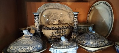 Lot 95 - Two shelves of mainly blue and white pottery.