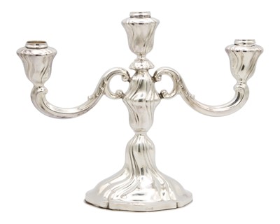 Lot 138 - A German 925 silver three-branch candelabra by Bruckmann & Sohne.