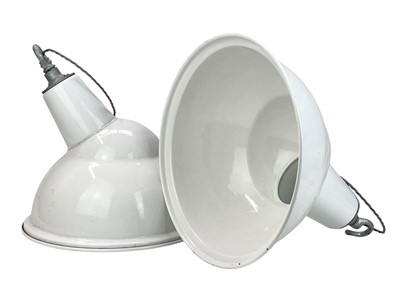 Lot 835 - A pair of Benjamin industrial white enamel angled shades.