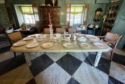 Lot 106 - A late Victorian painted walnut extending dining table.