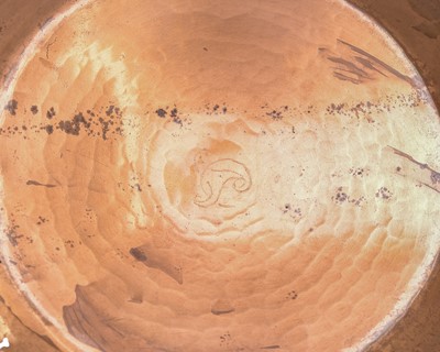 Lot 11 - Francis 'Bert' Cargeeg, a hand wrought copper dish.