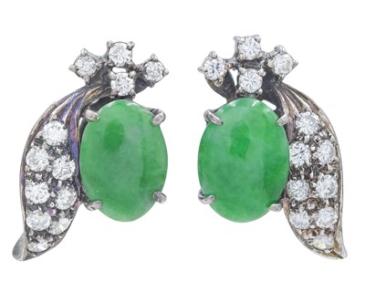 Lot 56 - A pair of white gold, jade, and diamond stud earrings.