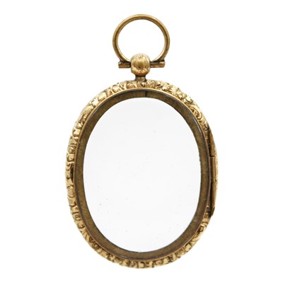 Lot 51 - A Victorian gold-plated double-sided locket.