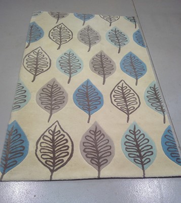Lot 52 - A Modern Leaf Pattern Rug. The Rug is 239cm by...