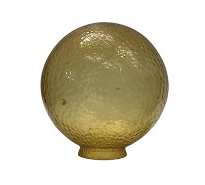 Lot 54 - A vintage amber glass spherical lamp shade,...