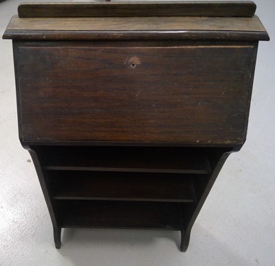 Lot 26 - An Oak Bookcase Bureau. The piece is 103cm...