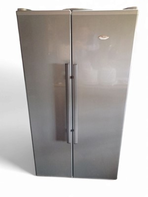 Lot 115 - A Whirlpool fridge freezer.