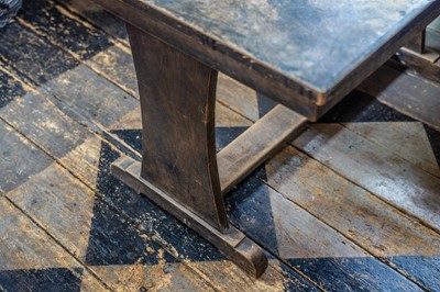 Lot 116 - A stained beech extending dining table.