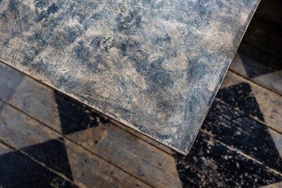 Lot 116 - A stained beech extending dining table.