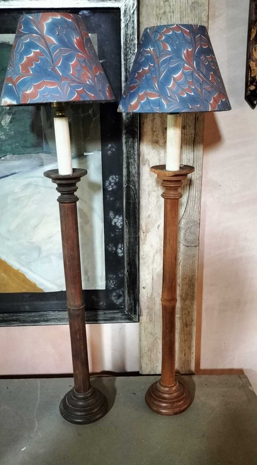 Lot 118 - A pair of tall bamboo table lamps.