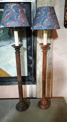 Lot 118 - A pair of tall bamboo table lamps.