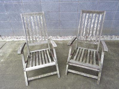 Lot 21 - Two Teak Garden Chairs.