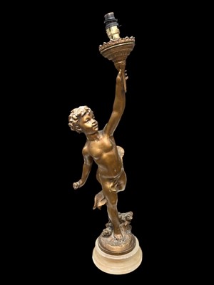 Lot 43 - A bronzed plaster lamp in the form of a putti,...