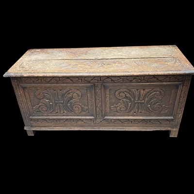Lot 17 - A Carved Oak Coffer. The Coffer is 49cm tall,...