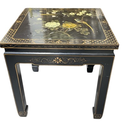 Lot 18 - A Lacquered Table. The Table is 51cm tall and...