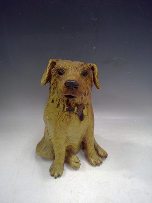 Lot 78 - A Ceramic Dog. The Dog is 26cm tall.