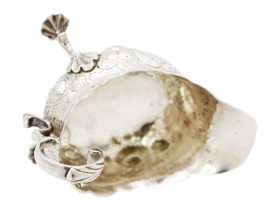 Lot 88 - A George II silver sauce boat with foliate embossed decoration.