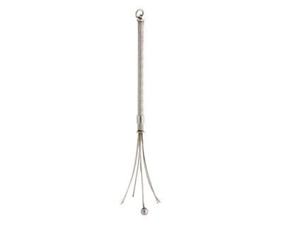 Lot 200 - A George V silver champagne whisk or swizzle stick with bright cut decoration.