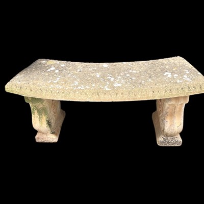 Lot 85 - A reconstituted stone garden bench, 105cm wide...