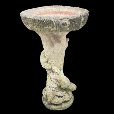 Lot 90 - A reconstituted stone birdbath, 61cm high.