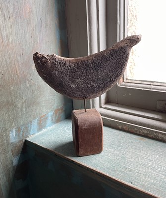 Lot 126 - A sculptural driftwood abstract bird figure.