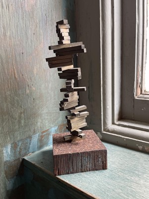 Lot 127 - An abstract brass sculpture.