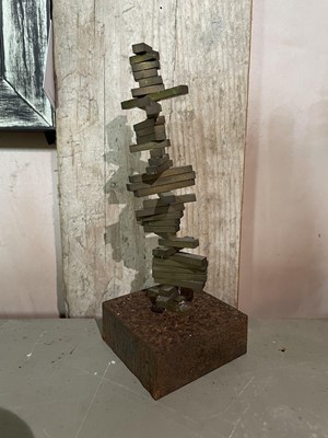 Lot 127 - An abstract brass sculpture.