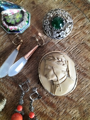 Lot 129 - A 19th century Italian oval lava cameo brooch.