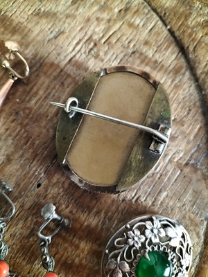 Lot 129 - A 19th century Italian oval lava cameo brooch.