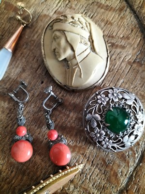 Lot 129 - A 19th century Italian oval lava cameo brooch.