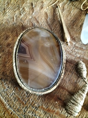 Lot 129 - A 19th century Italian oval lava cameo brooch.