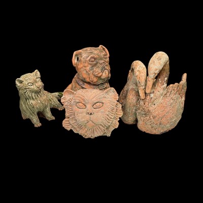 Lot 95 - Three terracotta garden ornaments and a swan...