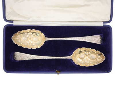 Lot 95 - A good pair of George III silver berry serving spoons by Mary Sumner.
