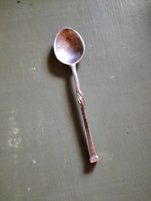 Lot 132 - Omar Ramsden, an Arts and Crafts silver preserve spoon.
